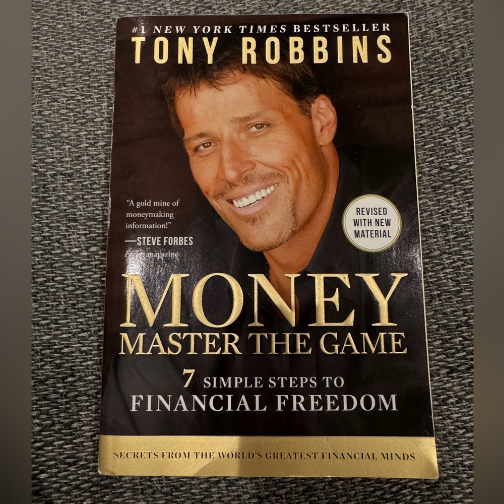'Money Master the Game' 7 simple steps to financial freedom Book by Tony Robbins